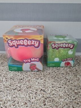 Squeeezy PEACH and DICE NEW IN BOX